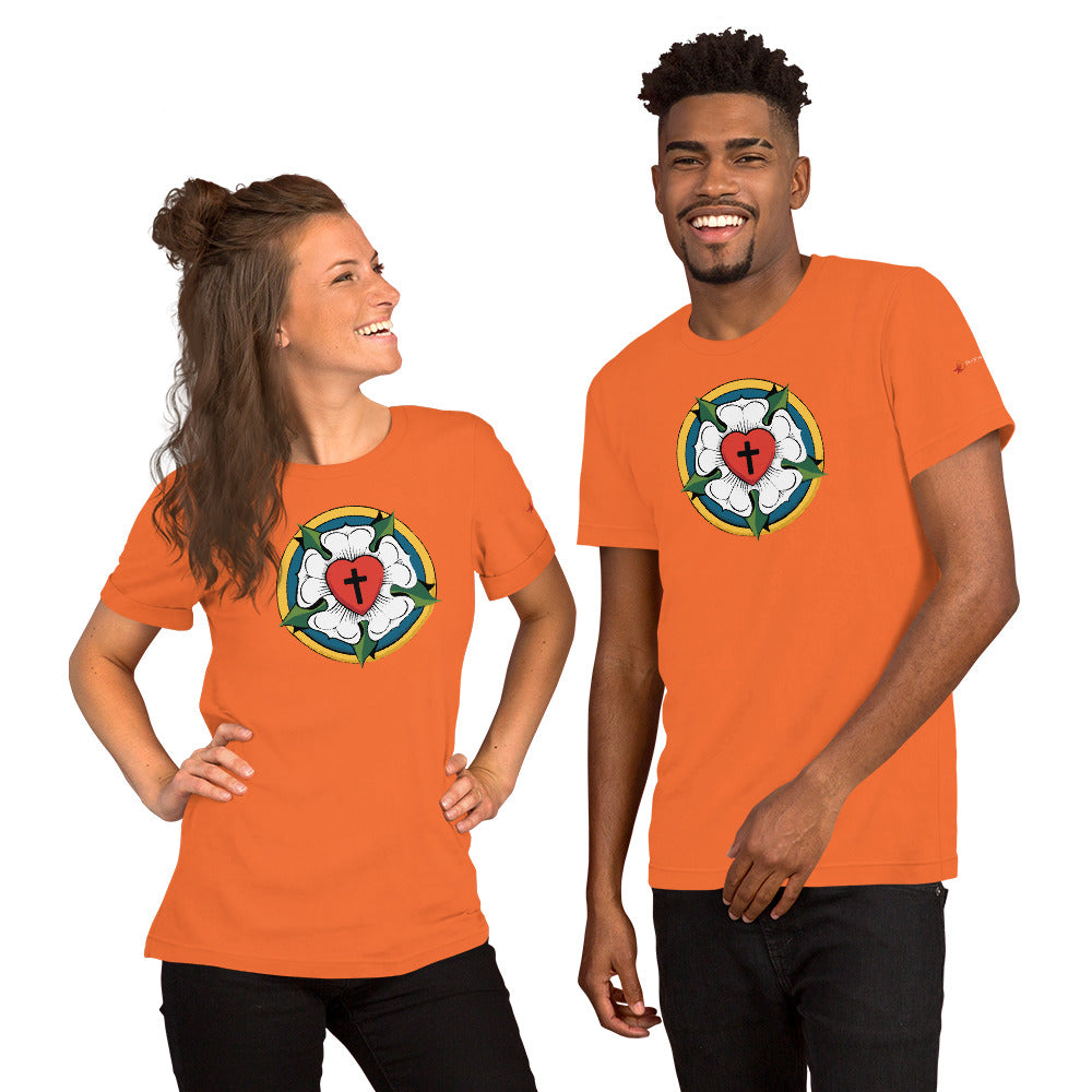 Lifestyle storefront presentation of the vibrant orange custom printed graphic Luther Rose tee modeled by a couple.