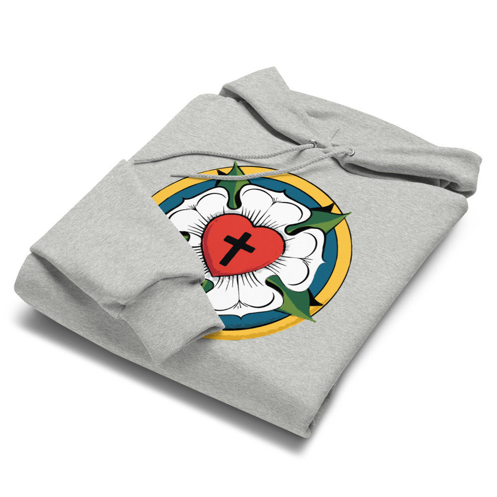 Neatly folded light steel Champion Powerblend sweatshirt on a clean white background, emphasizing the large Luther Rose print for Christian lifestyle retail.