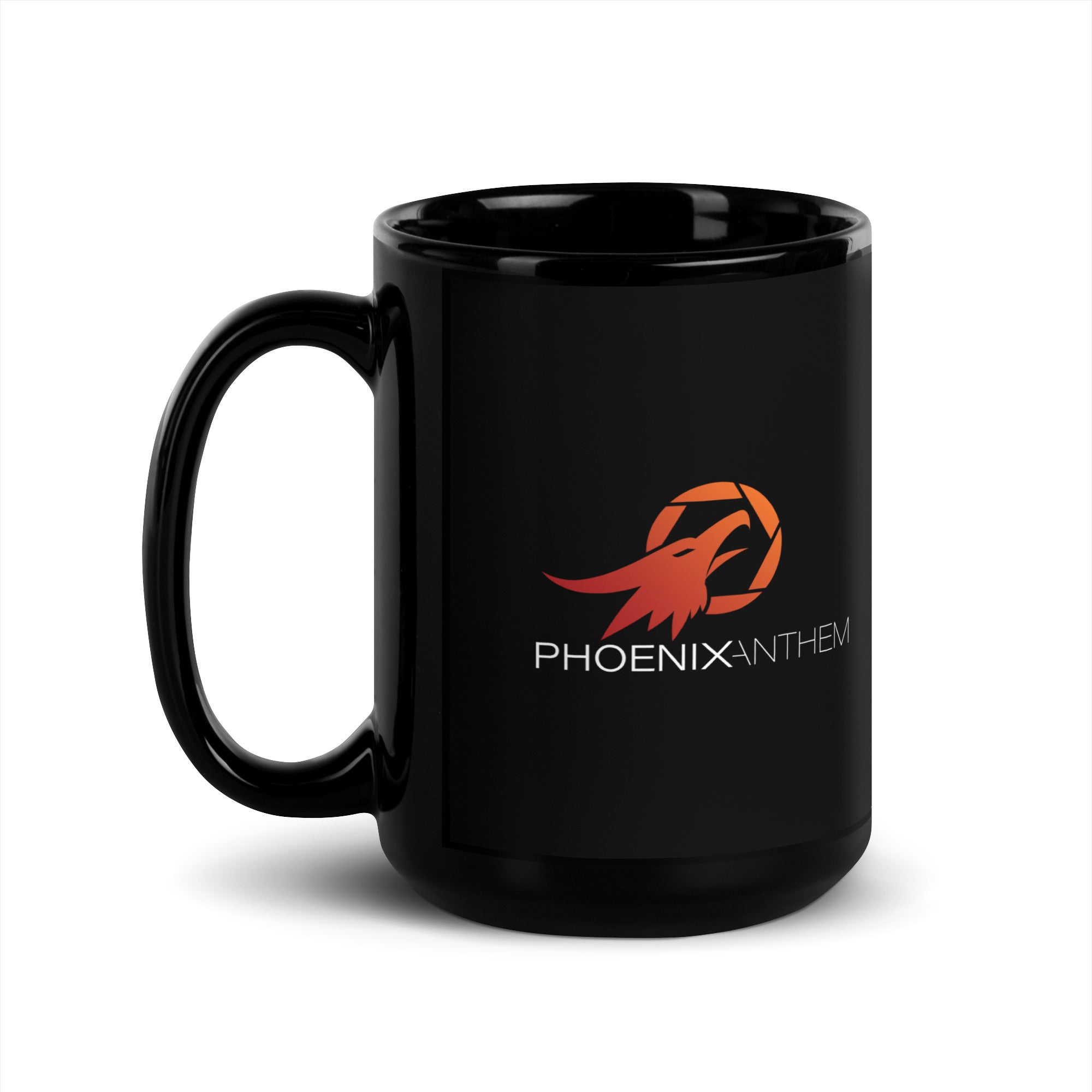 Left-handle view of the Phoenix Anthem glossy black mug. A striking ceramic design with red-orange logo and a smooth finish that reflects bold faith and craftsmanship.