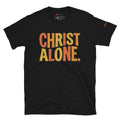 Black Christian graphic tee from Phoenix Anthem displaying a vintage multi-color "Christ Alone" design. Faith-based streetwear and Confessional Lutheran clothing celebrating Solus Christus.