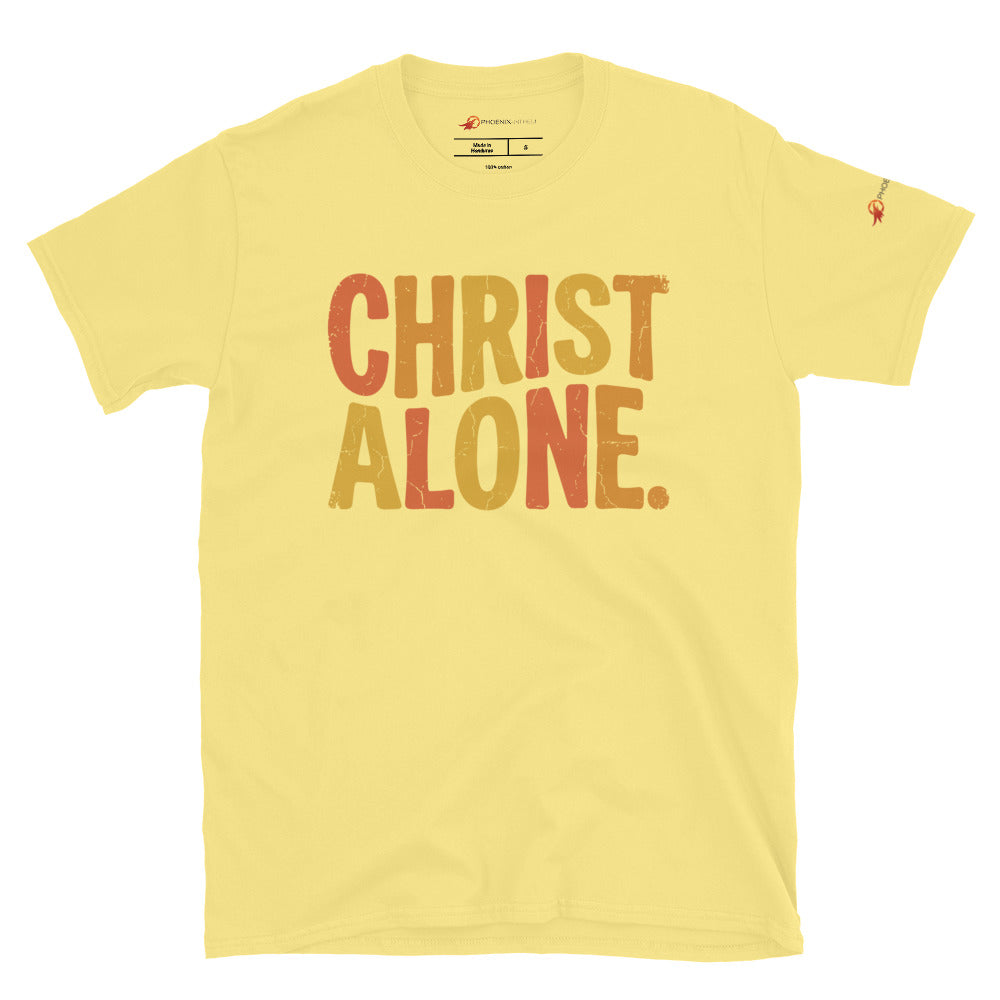 Cornsilk Yellow Christian graphic tee from Phoenix Anthem displaying a vintage multi-color "Christ Alone" design. Faith-based streetwear and Confessional Lutheran clothing celebrating Solus Christus.