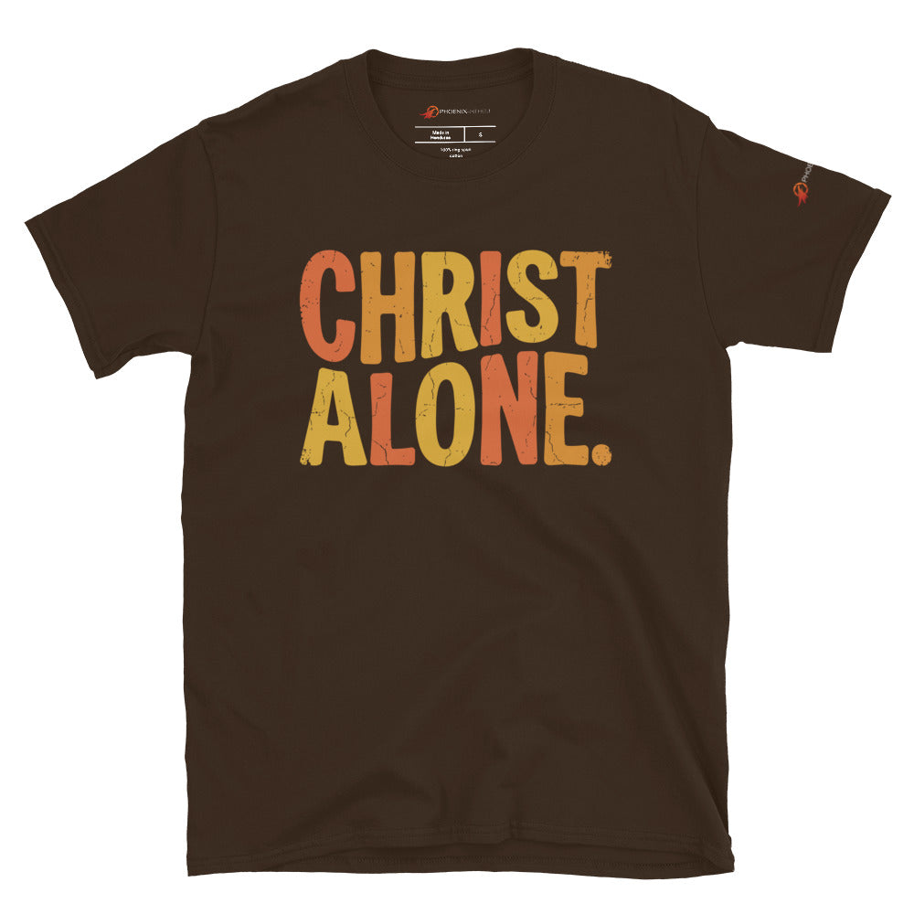 Dark chocolate brown Christian graphic tee from Phoenix Anthem displaying a vintage multi-color "Christ Alone" design. Faith-based streetwear and Confessional Lutheran clothing celebrating Solus Christus.