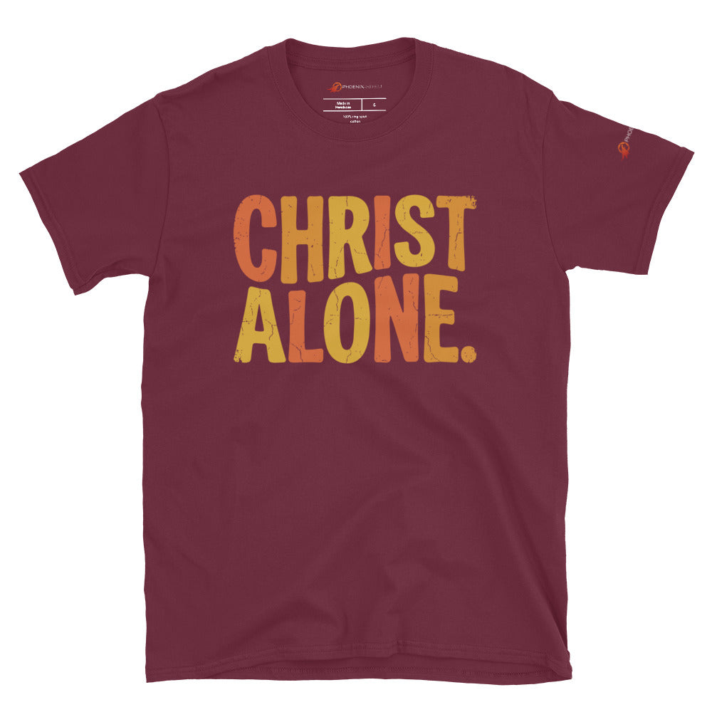 Maroon burgundy Christian graphic tee from Phoenix Anthem displaying a vintage multi-color "Christ Alone" design. Faith-based streetwear and Confessional Lutheran clothing celebrating Solus Christus.