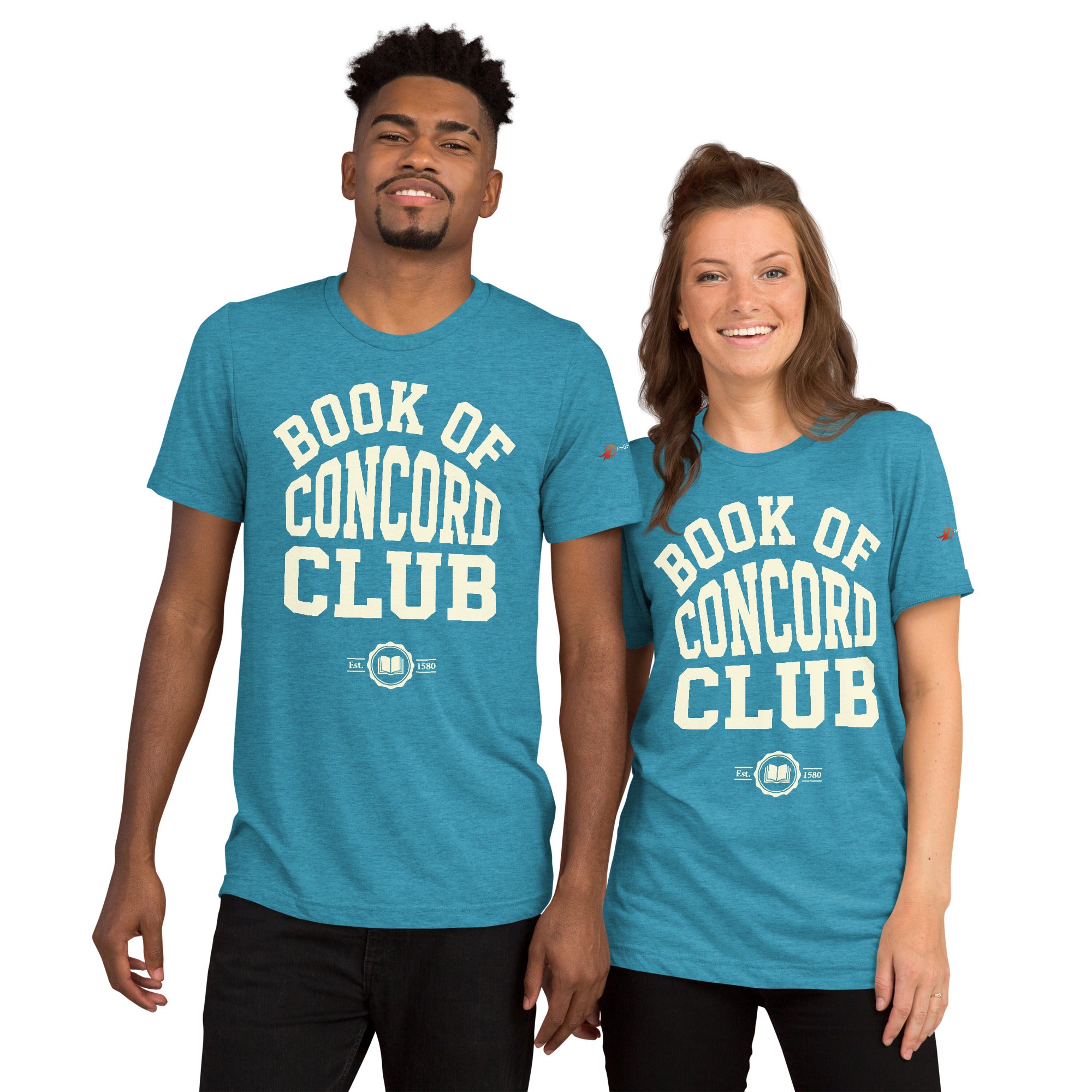 A man and woman modeling matching aqua tri-blend t-shirts featuring a collegiate "Book of Concord Club Est. 1580" graphic design. Premium Lutheran apparel and Christian theology clothing for men and women.