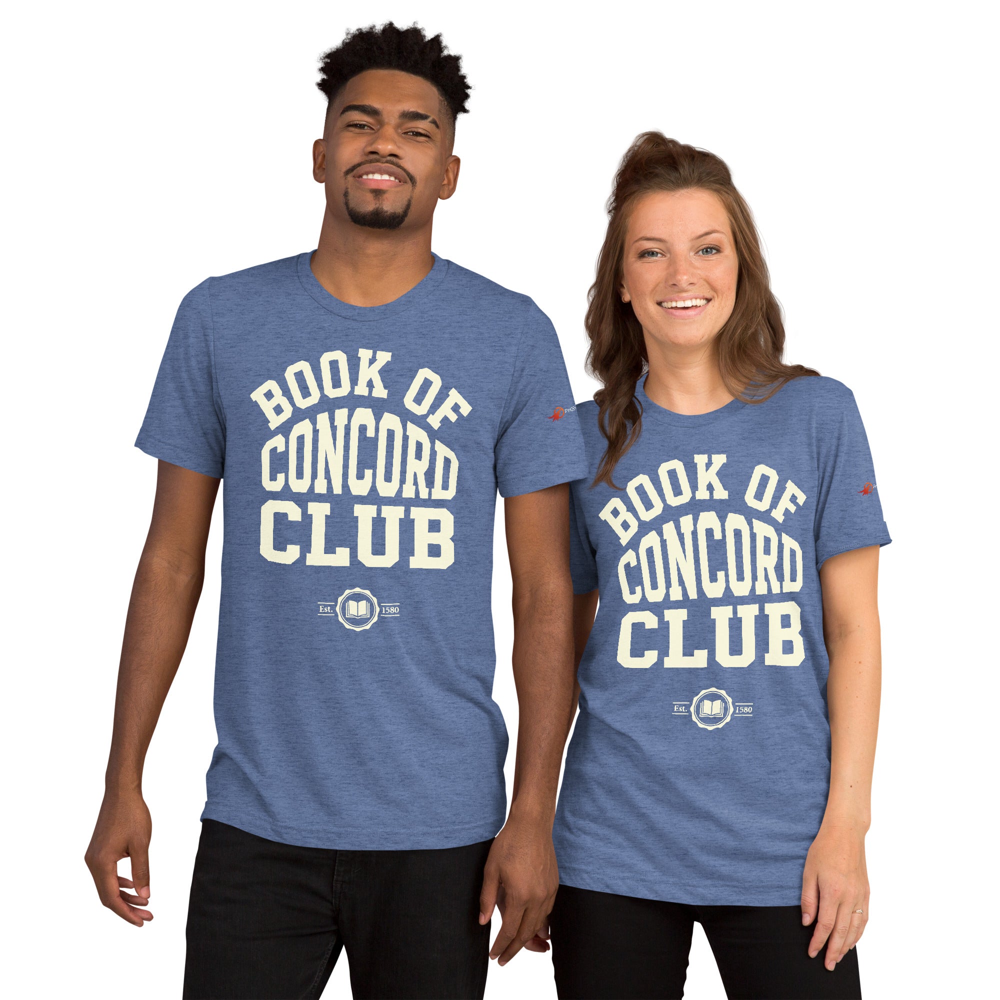 A man and woman modeling matching blue tri-blend t-shirts featuring a collegiate "Book of Concord Club Est. 1580" graphic design. Premium Lutheran apparel and Christian theology clothing for men and women.