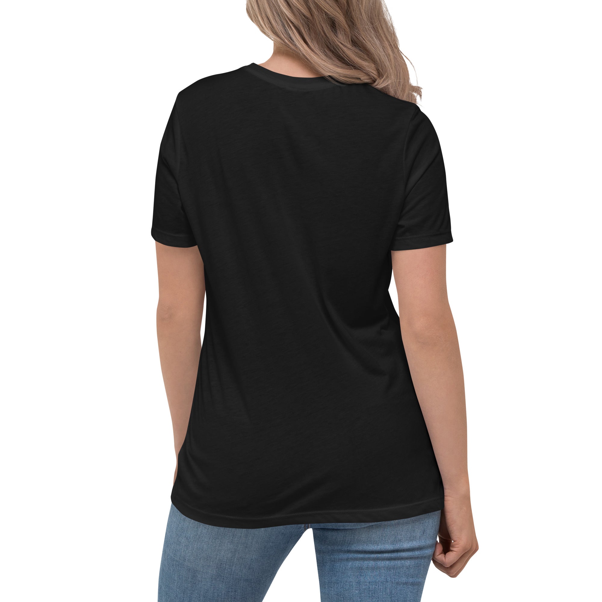 Rear view of a blonde woman wearing a black relaxed-fit Christian t-shirt with blue jeans. Clean plain back profile view of high-quality women's faith-based apparel from Phoenix Anthem.