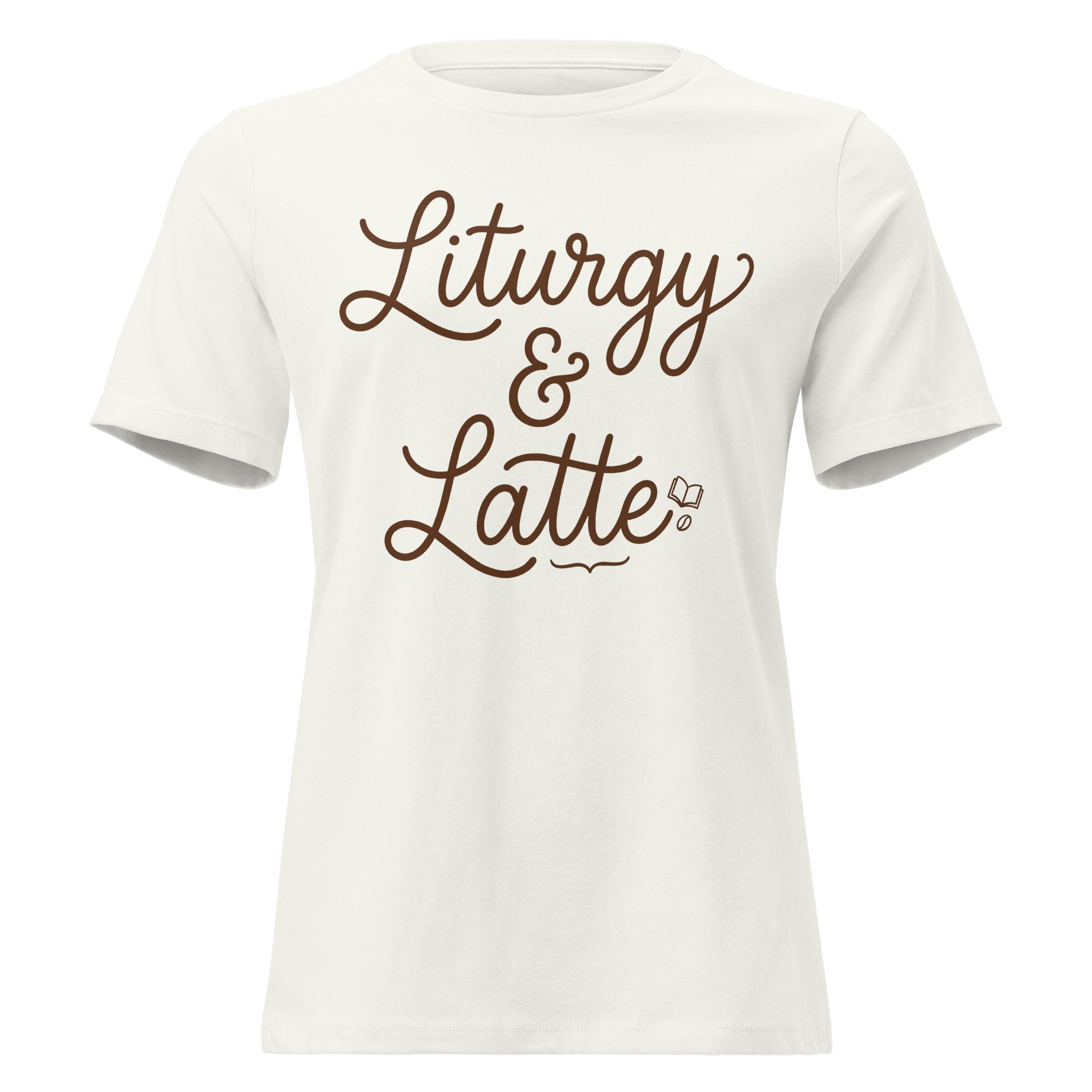 Front view of a vintage white women's relaxed-fit Christian t-shirt featuring the phrase 'Liturgy & Latte' in a brown cursive script with a small book and coffee bean icon. Retro liturgical faith-based apparel from Phoenix Anthem.